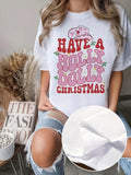 Holly Jolly Western Christmas T Shirt for Men Women, Unisex Pink Cow Print Cowboy Hat Holly Berry Country Xmas Graphic Short Sleeve Crewneck Tee