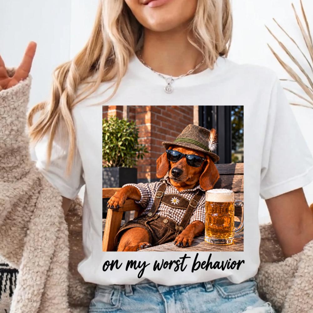 Funny Dachshund Oktoberfest T-Shirt, “On My Wurst Behavior” Wiener Dog Beer Graphic Tee, Casual Bavarian Style Top, Gift for Dog Lovers